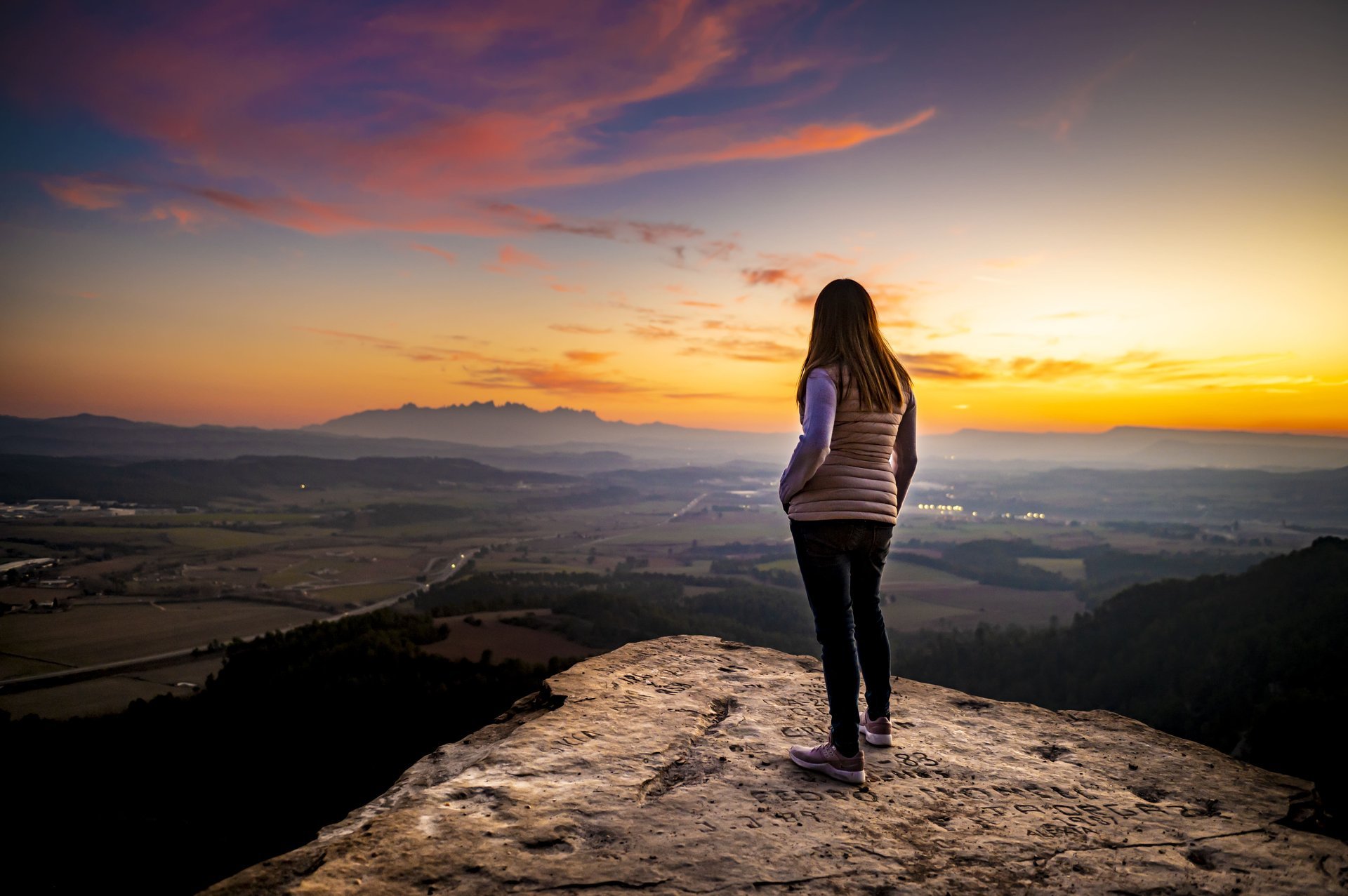 silhouette with Montserrat in the background
